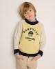 Damian yellow sweater