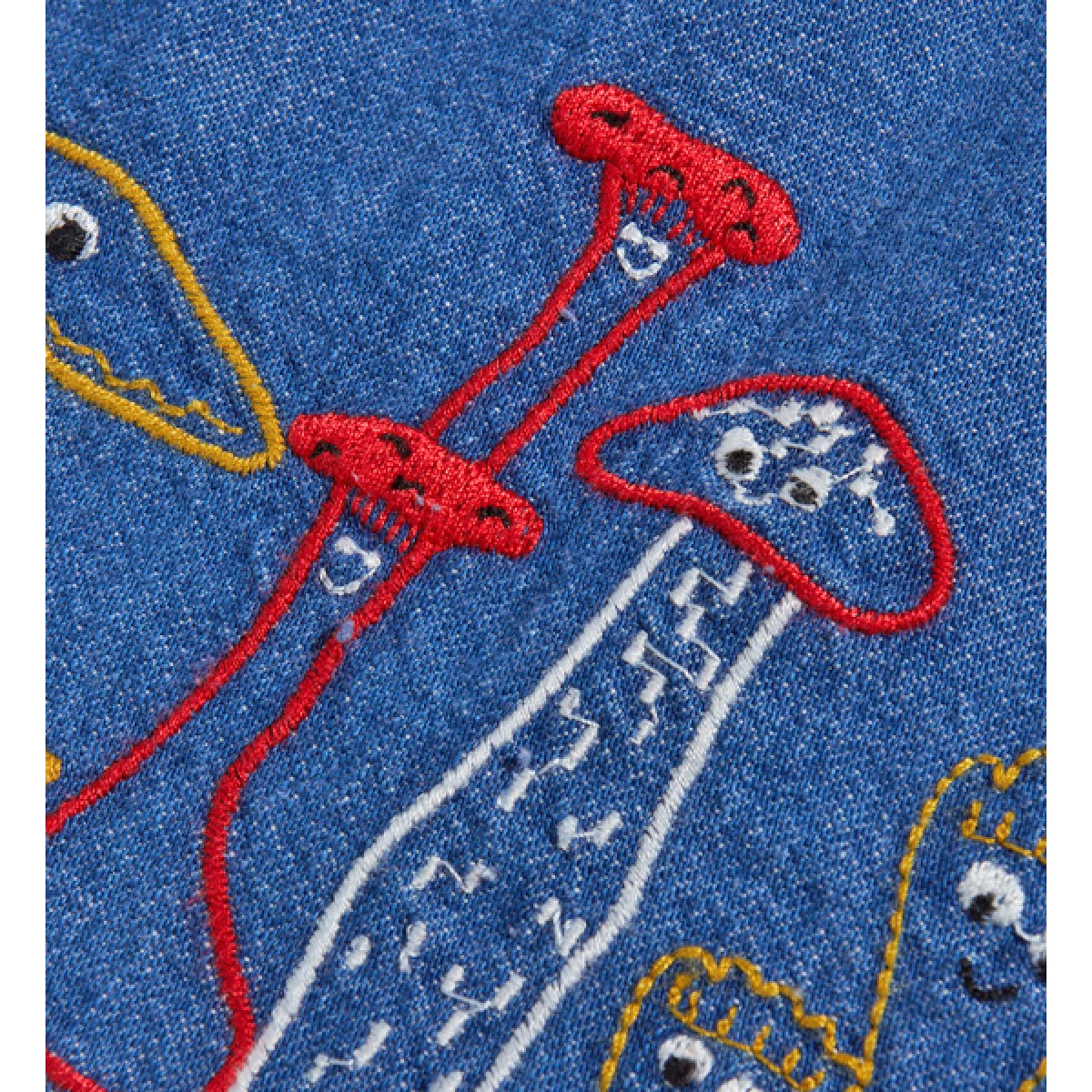 Denim dress with embroidered mushrooms